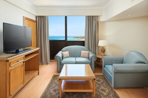 Junior Suite, 1 Queen Bed, Balcony, Sea View | Minibar, in-room safe, desk, iron/ironing board
