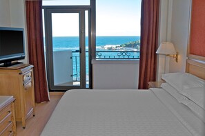 Junior Suite, 1 Queen Bed, Balcony, Sea View | Minibar, in-room safe, desk, iron/ironing board