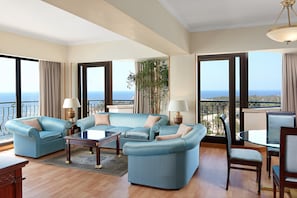 Presidential Suite, 1 King Bed, Smoking | Living room | 49-inch LED TV with satellite channels, Smart TV