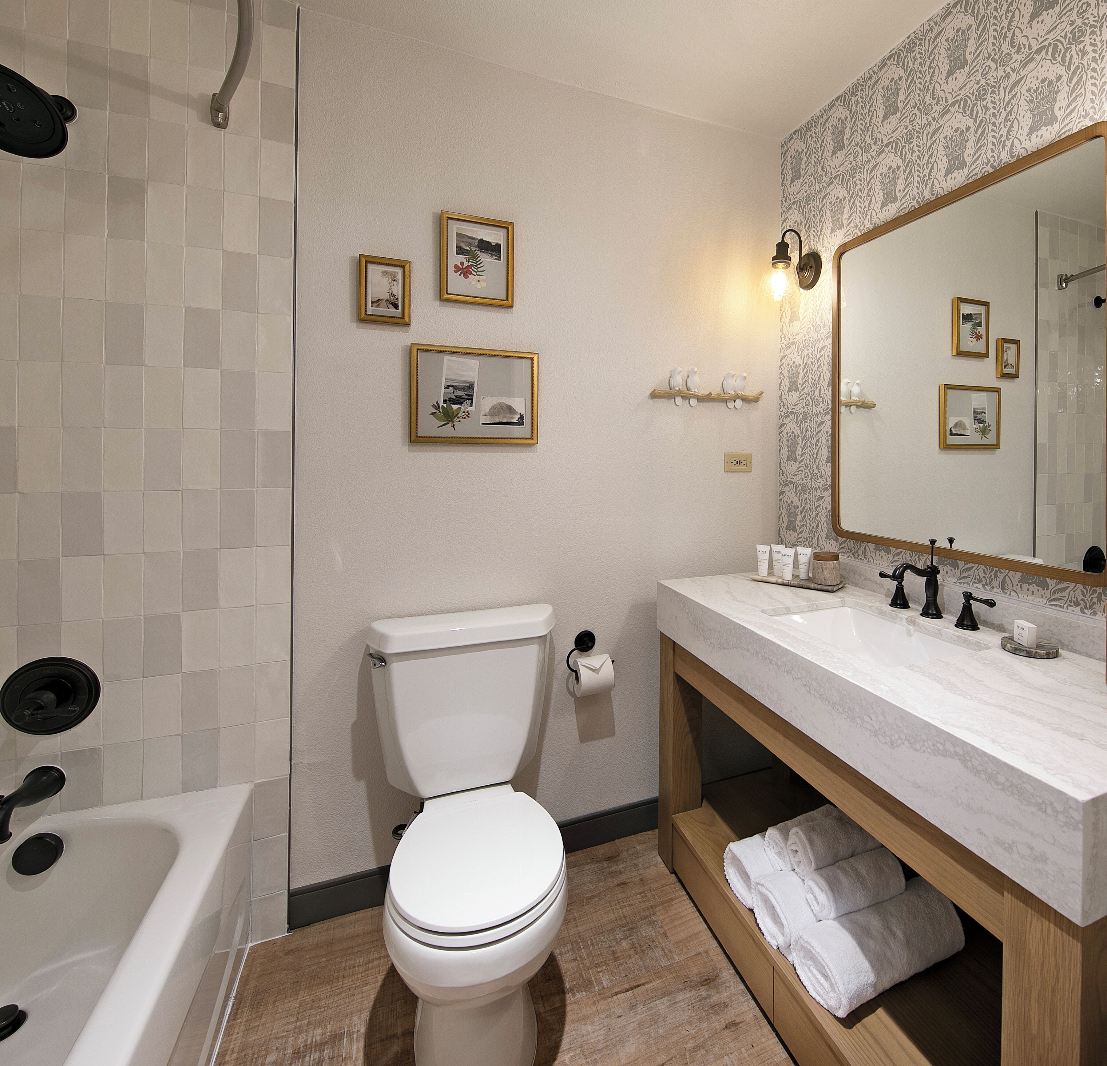 shower, eco-friendly toiletries, hair dryer, towels