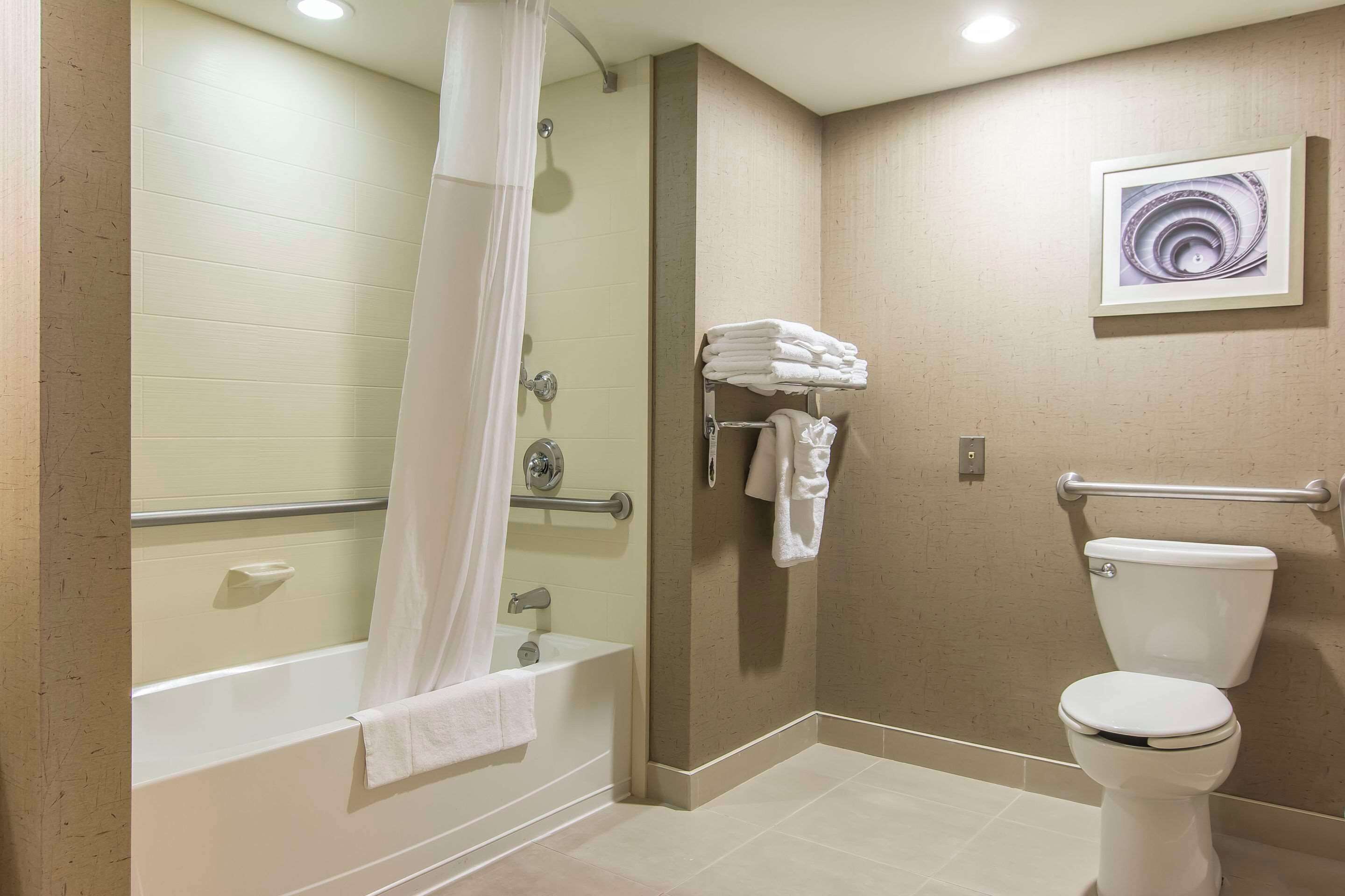 premium bedding, pillow-top beds, desk, blackout curtains