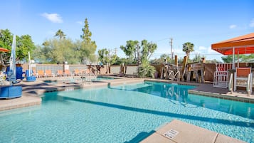 Outdoor pool, a heated pool, sun loungers