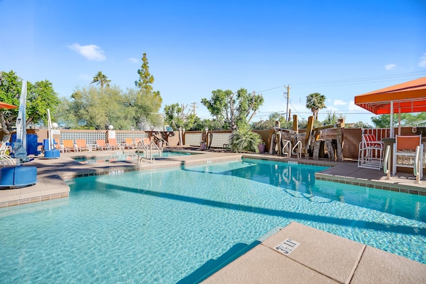 Outdoor pool, a heated pool, sun loungers