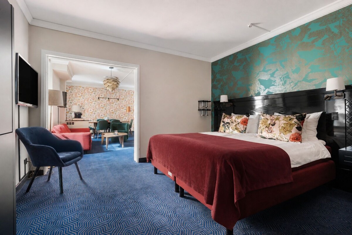 Suite junior | Ropa de cama hipoalergénica, minibar, caja fuerte y escritorio