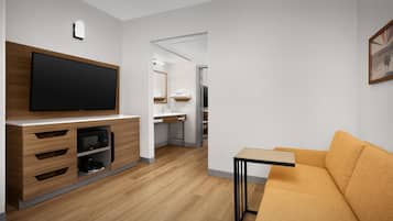 Two Double Bed Suite | Living area | 50-inch flat-screen TV with satellite channels, TV