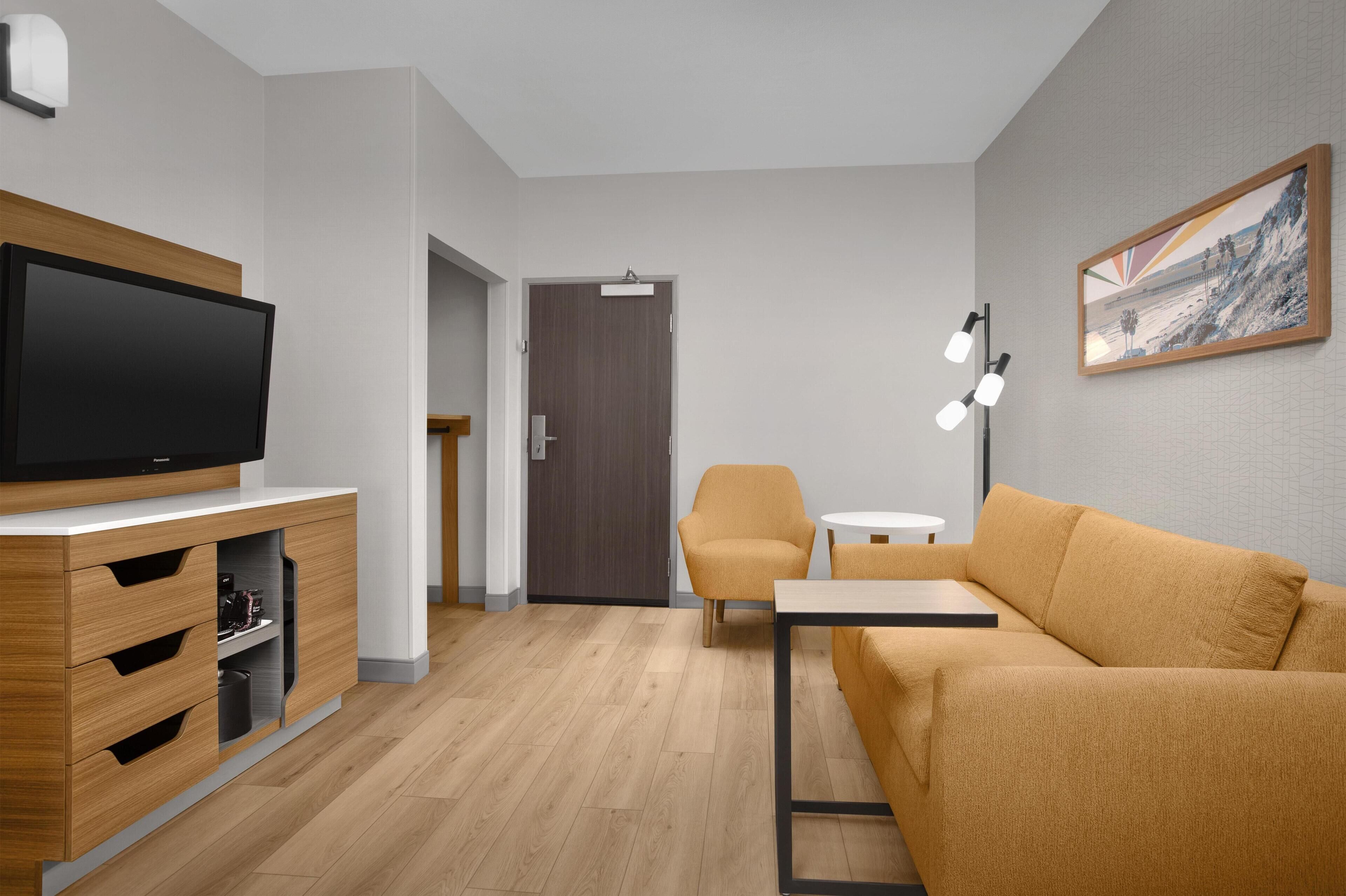 One King Bed, Non-Smoking, Accessible | Living area | 50-inch flat-screen TV with satellite channels, TV