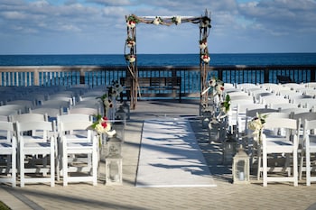 Outdoor wedding area at Embassy Suites by Hilton Deerfield Beach Resort & Spa