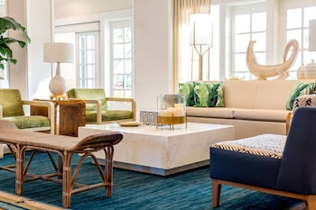 Hotel entrance and lobby at Embassy Suites by Hilton Deerfield Beach Resort & Spa