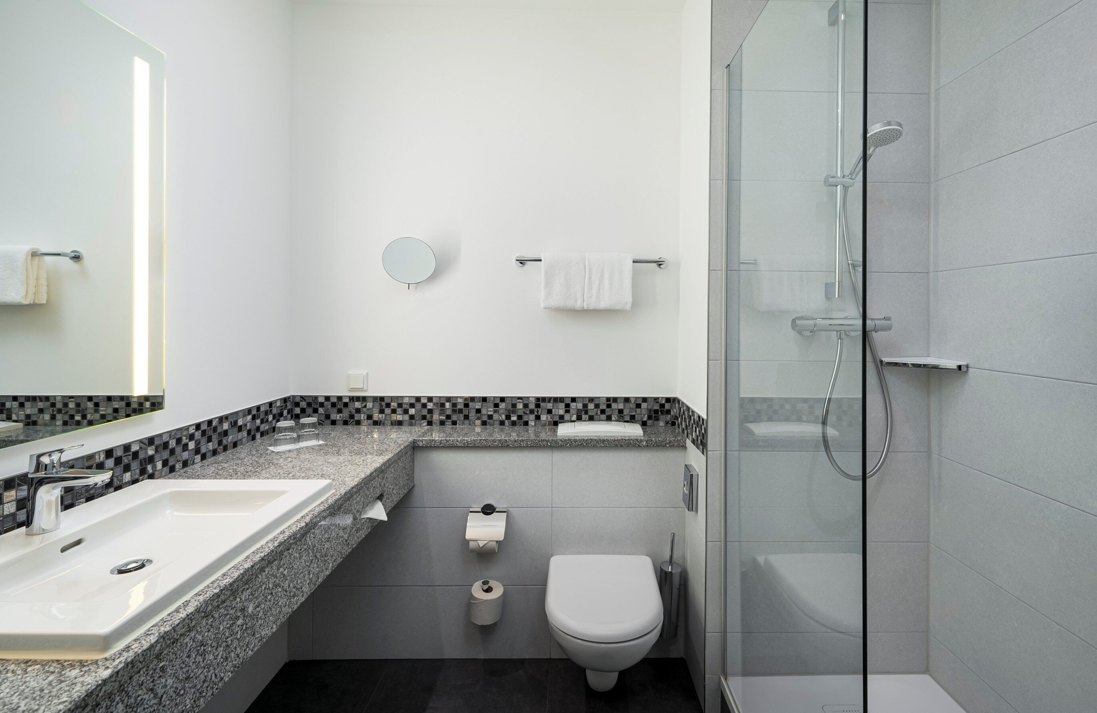 eco-friendly toiletries, hair dryer, towels