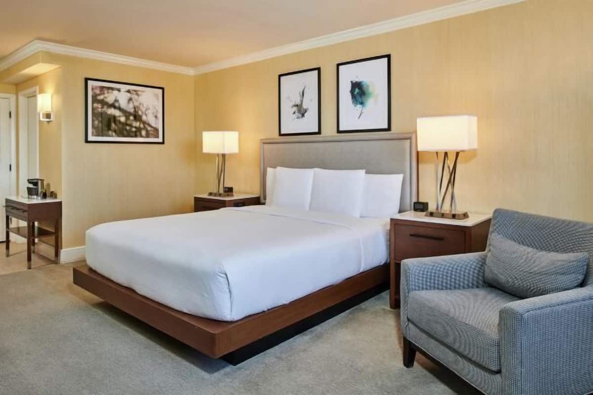 Premium bedding, down duvets, pillow-top beds, in-room safe
