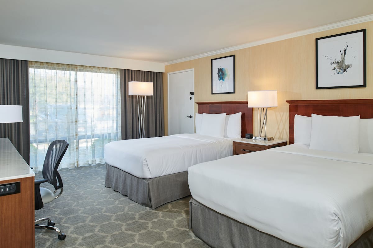 premium bedding, down duvets, pillow-top beds, in-room safe