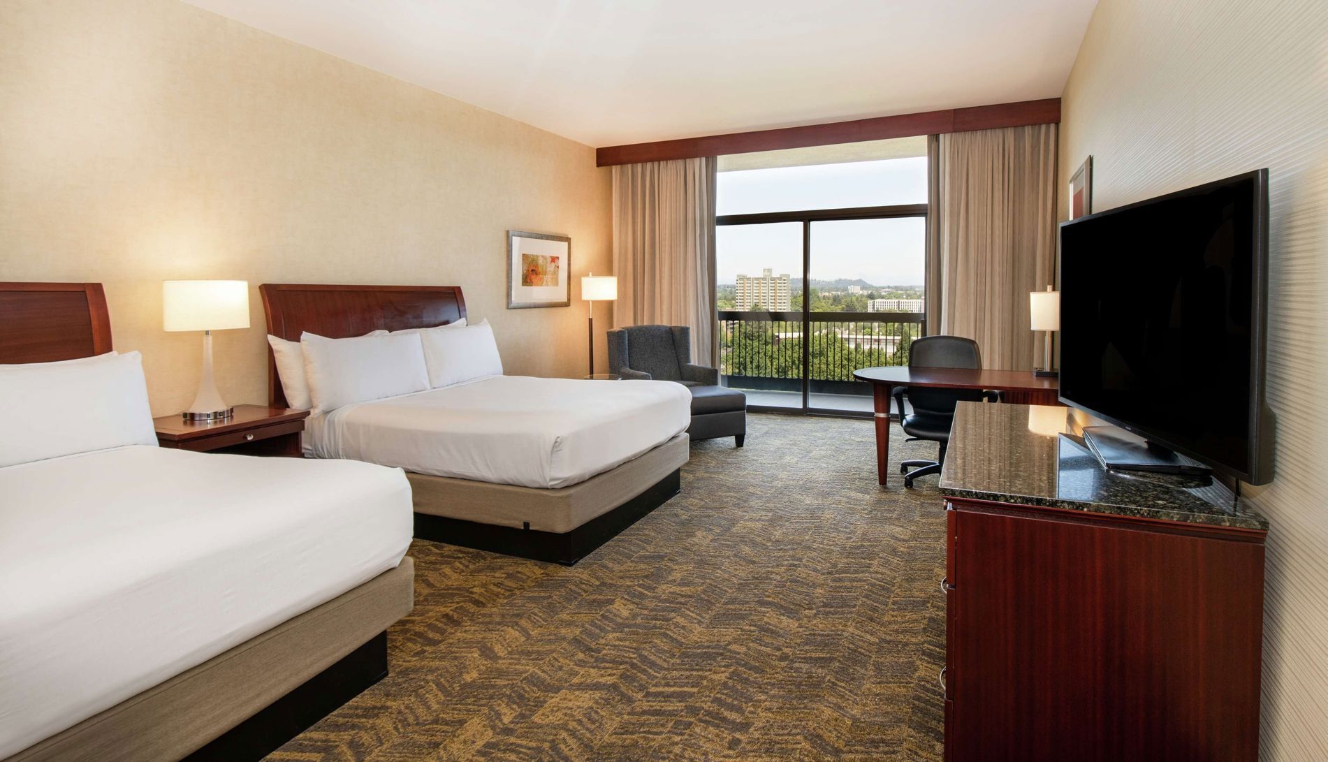 Premium bedding, down comforters, pillowtop beds, in-room safe