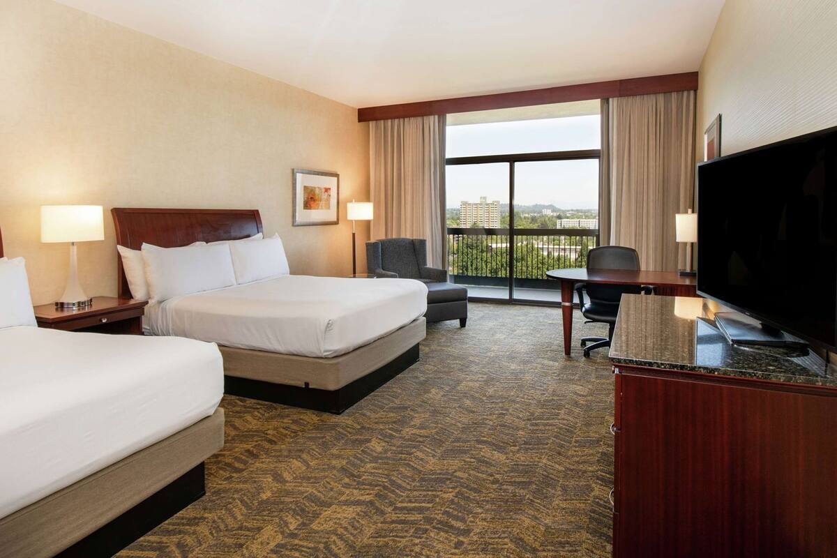 Premium bedding, down comforters, pillowtop beds, in-room safe