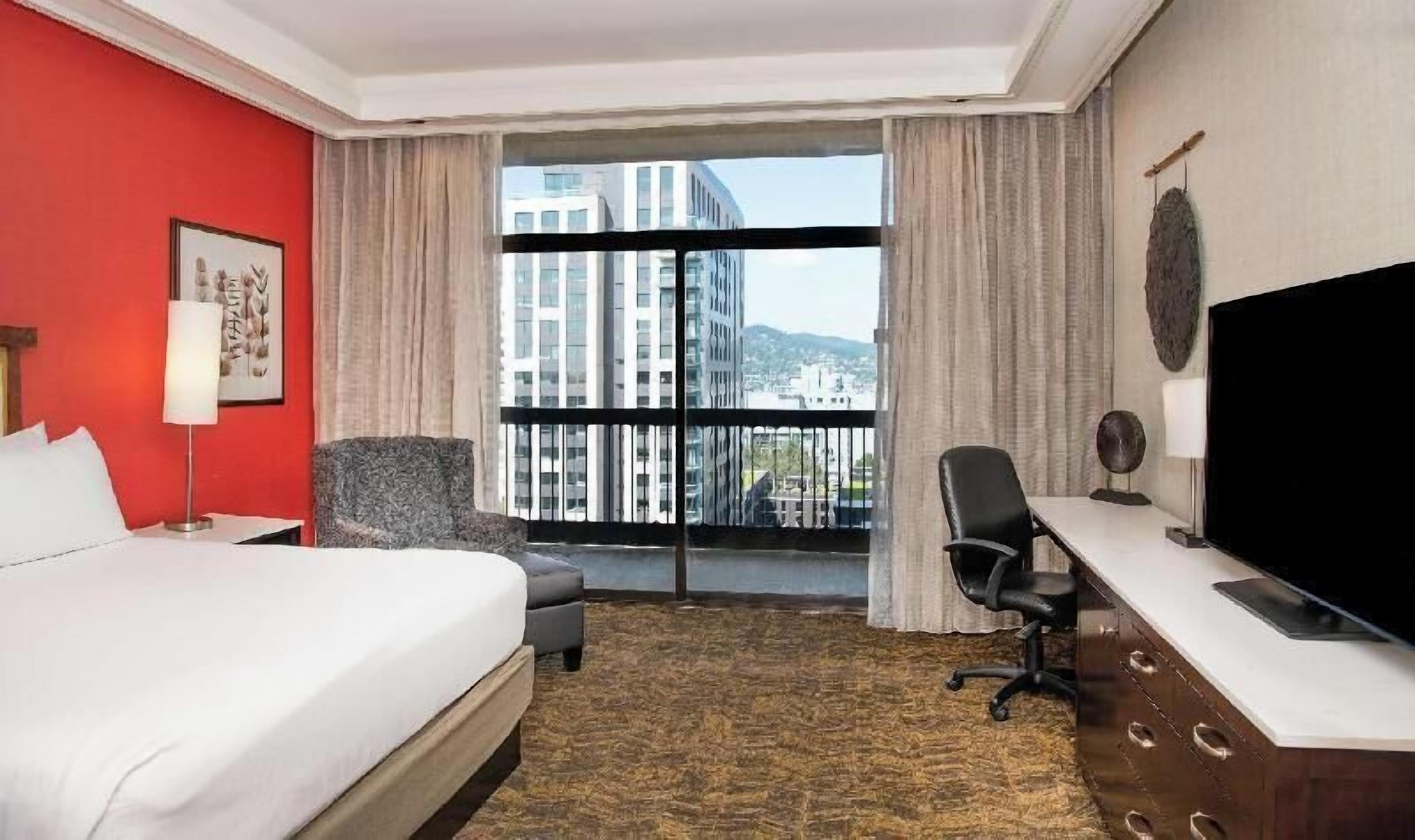 Premium bedding, down comforters, pillowtop beds, in-room safe