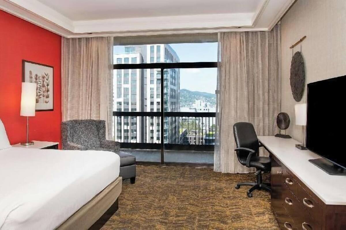 Premium bedding, down comforters, pillowtop beds, in-room safe