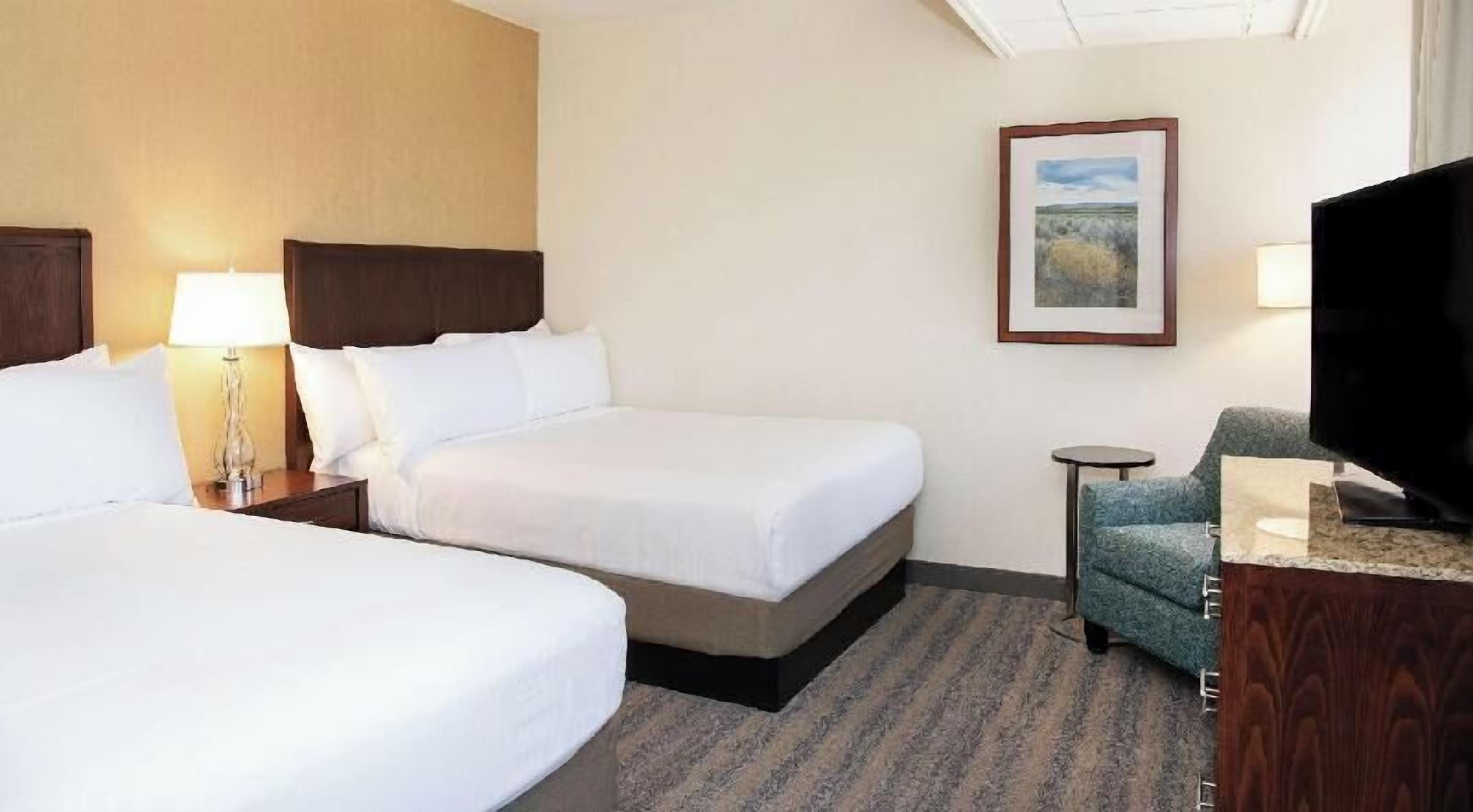Premium bedding, down comforters, pillowtop beds, in-room safe