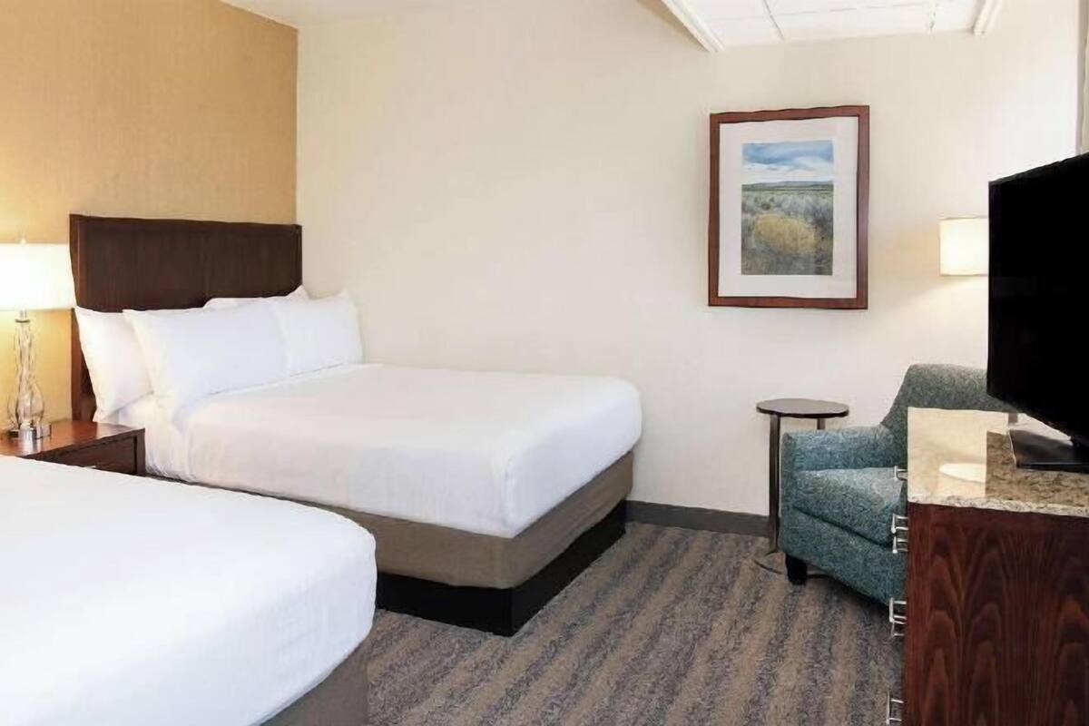Premium bedding, down comforters, pillowtop beds, in-room safe