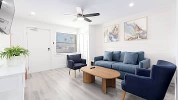 Siesta, 2 Bedroom | Living area | 50-inch TV with cable channels