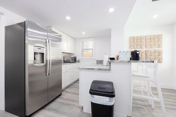 Siesta, 2 Bedroom | Private kitchen | Fridge, microwave, coffee/tea maker, eco-friendly cleaning products at Siesta Key Beach Resort and Suites