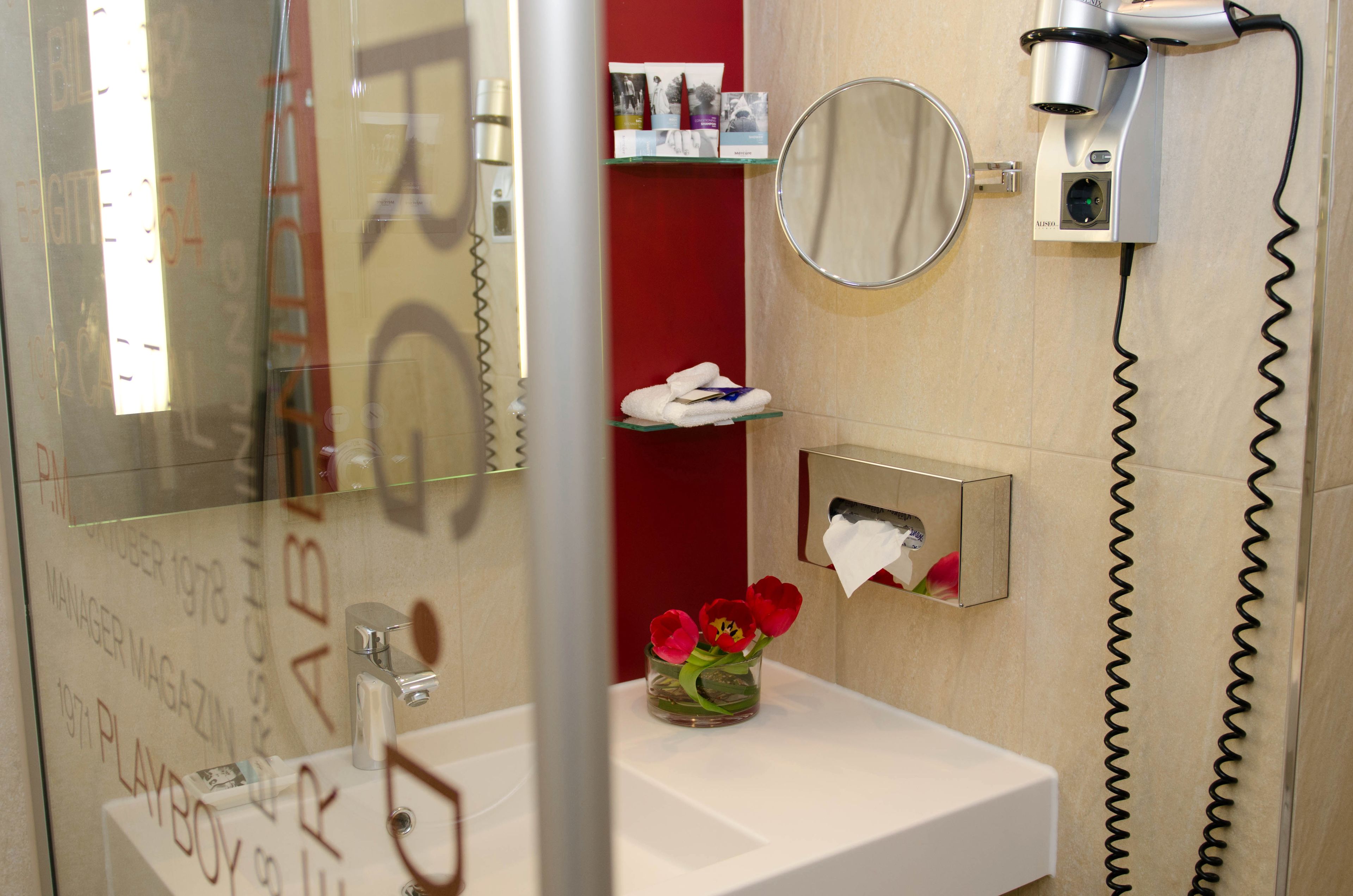eco-friendly toiletries, hair dryer, towels