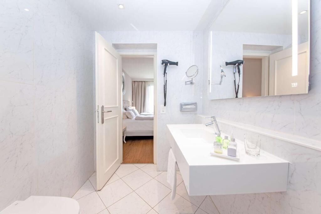 family room | bathroom | hair dryer, towels, soap, shampoo