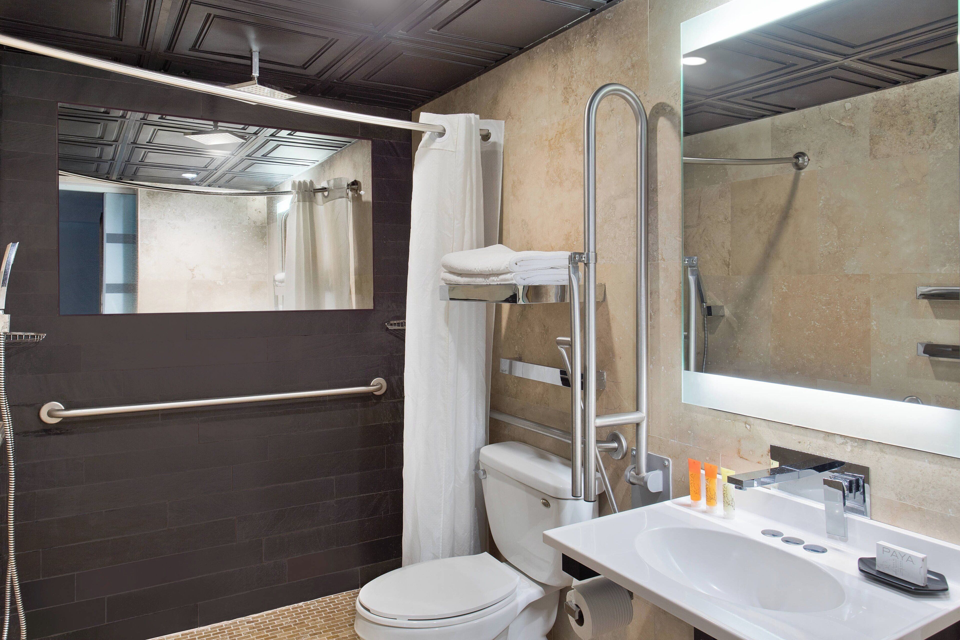 shower, eco-friendly toiletries, hair dryer, towels