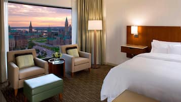 Premium bedding, down comforters, pillowtop beds, in-room safe