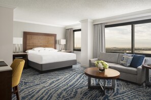 Larger Room, 1 King Bed | Premium bedding, pillow-top beds, in-room safe, desk