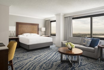 Larger Room, 1 King Bed | Premium bedding, pillowtop beds, in-room safe, desk at Hyatt Regency Orlando