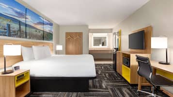 Room, 1 King Bed, Non Smoking | Individually decorated, individually furnished, desk, laptop workspace