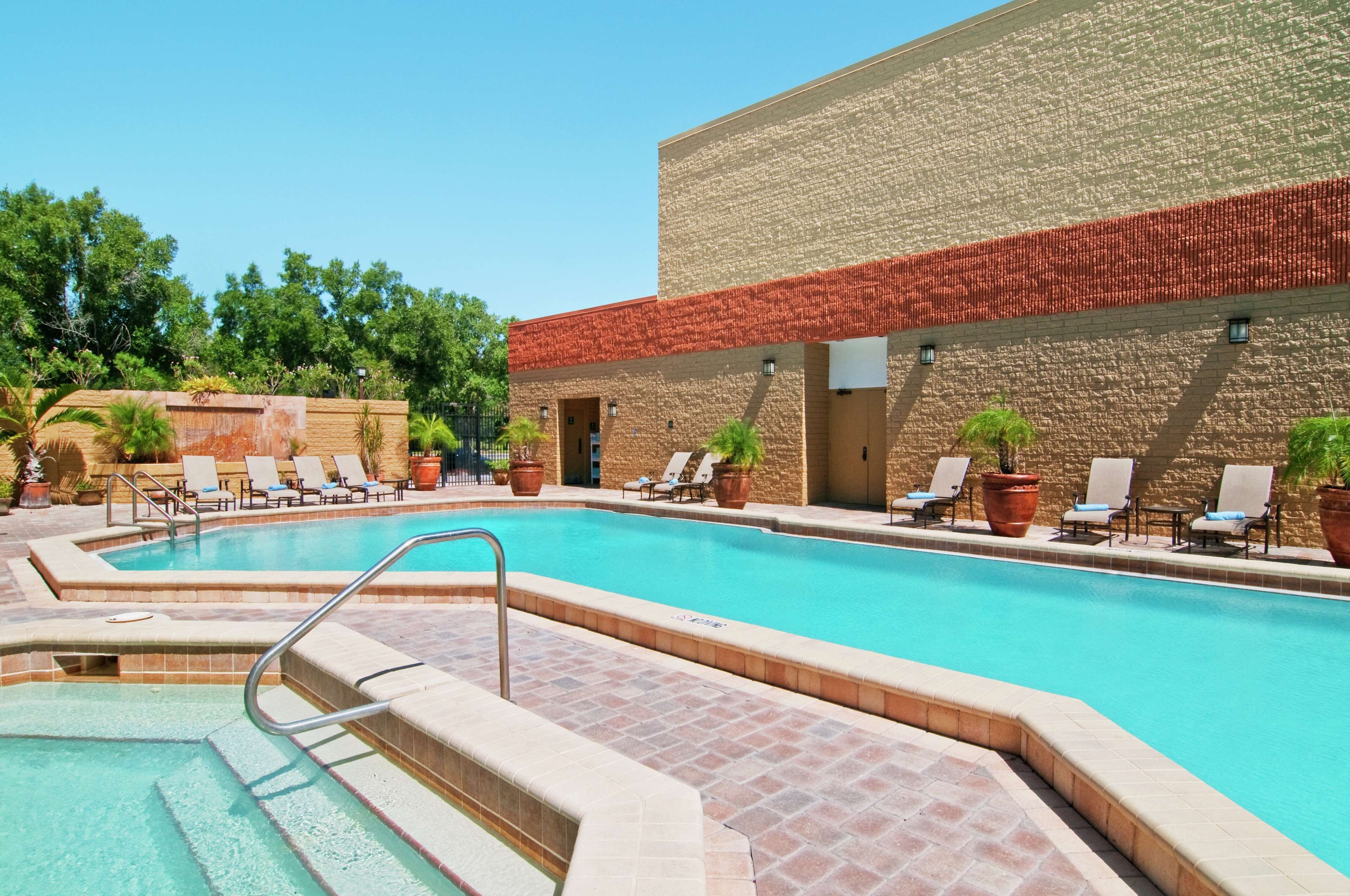 Outdoor pool, open 8:00 AM to 10:00 PM, pool umbrellas, pool loungers