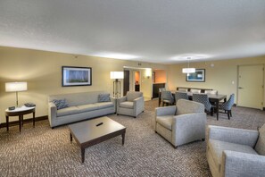 Presidential Suite, 1 King Bed | Living area | 50-inch flat-screen TV with cable channels, TV - Hilton Orlando/Altamonte Springs (Altamonte Springs)