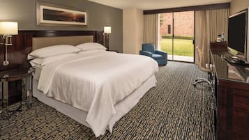 Premium bedding, down comforters, pillowtop beds, in-room safe