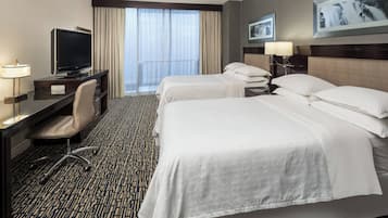 Premium bedding, down comforters, pillowtop beds, in-room safe