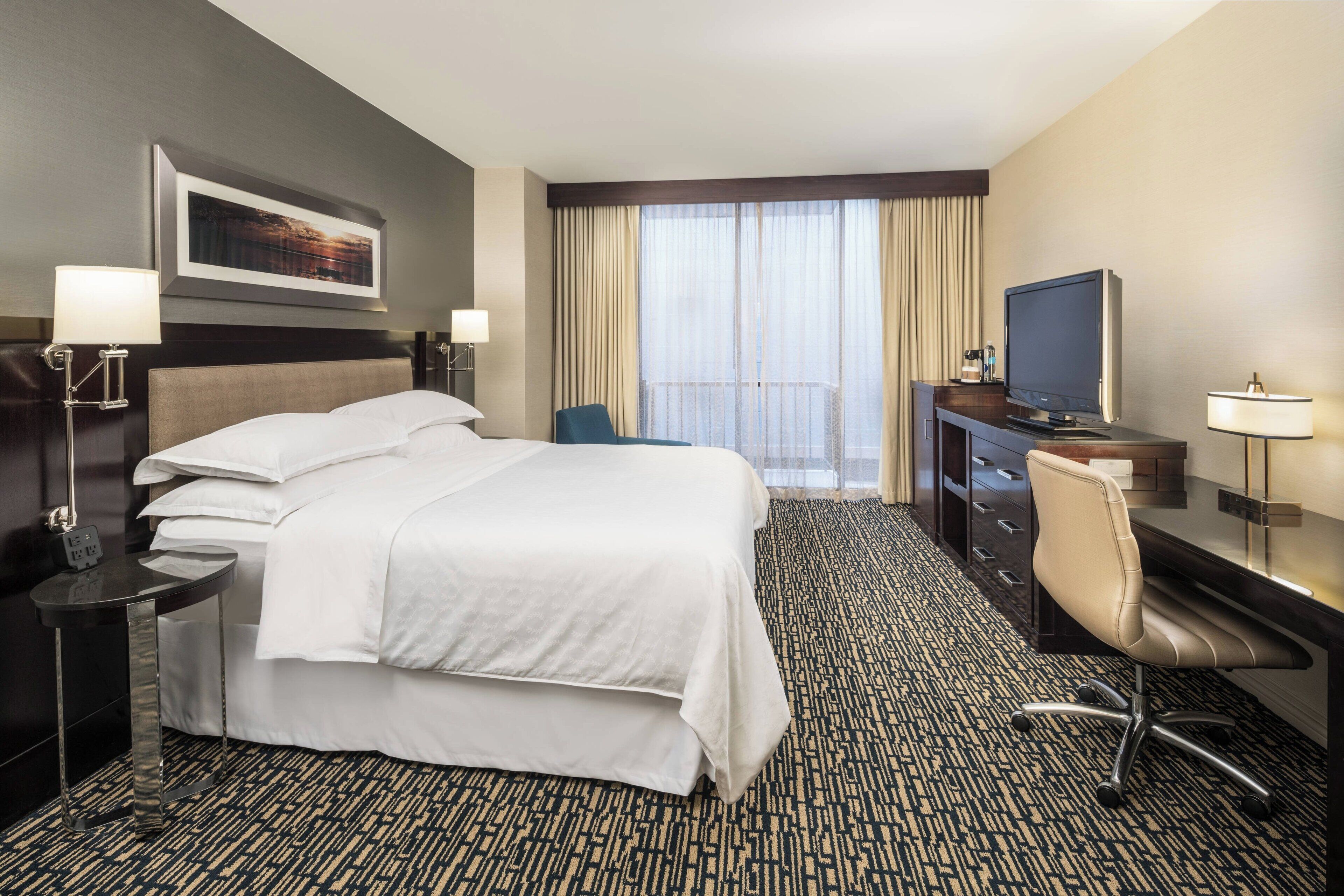 Premium bedding, down duvets, pillow-top beds, in-room safe