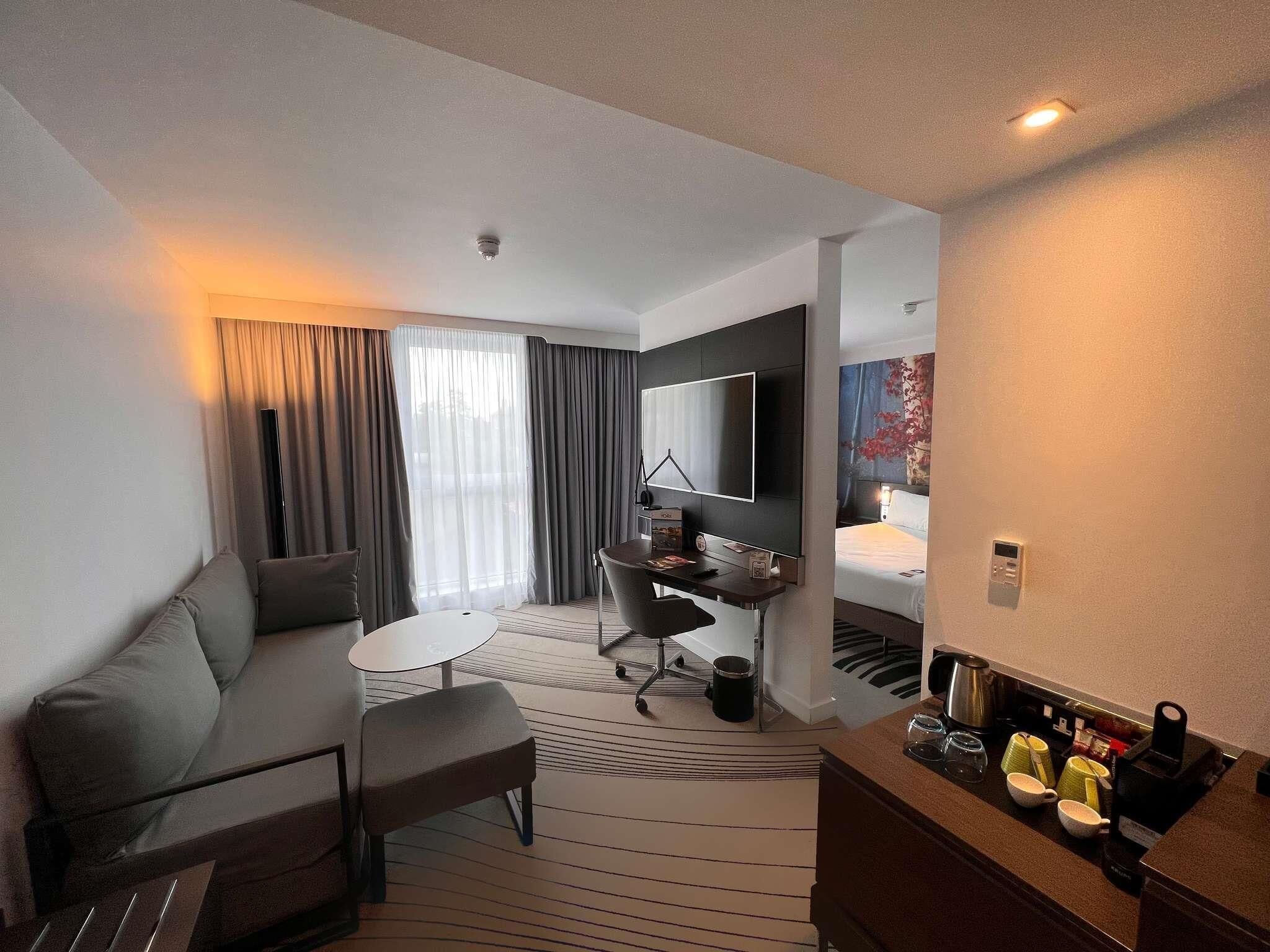 Junior Suite, 1 Queen Bed with Sofa bed | In-room safe, laptop workspace, blackout drapes, iron/ironing board