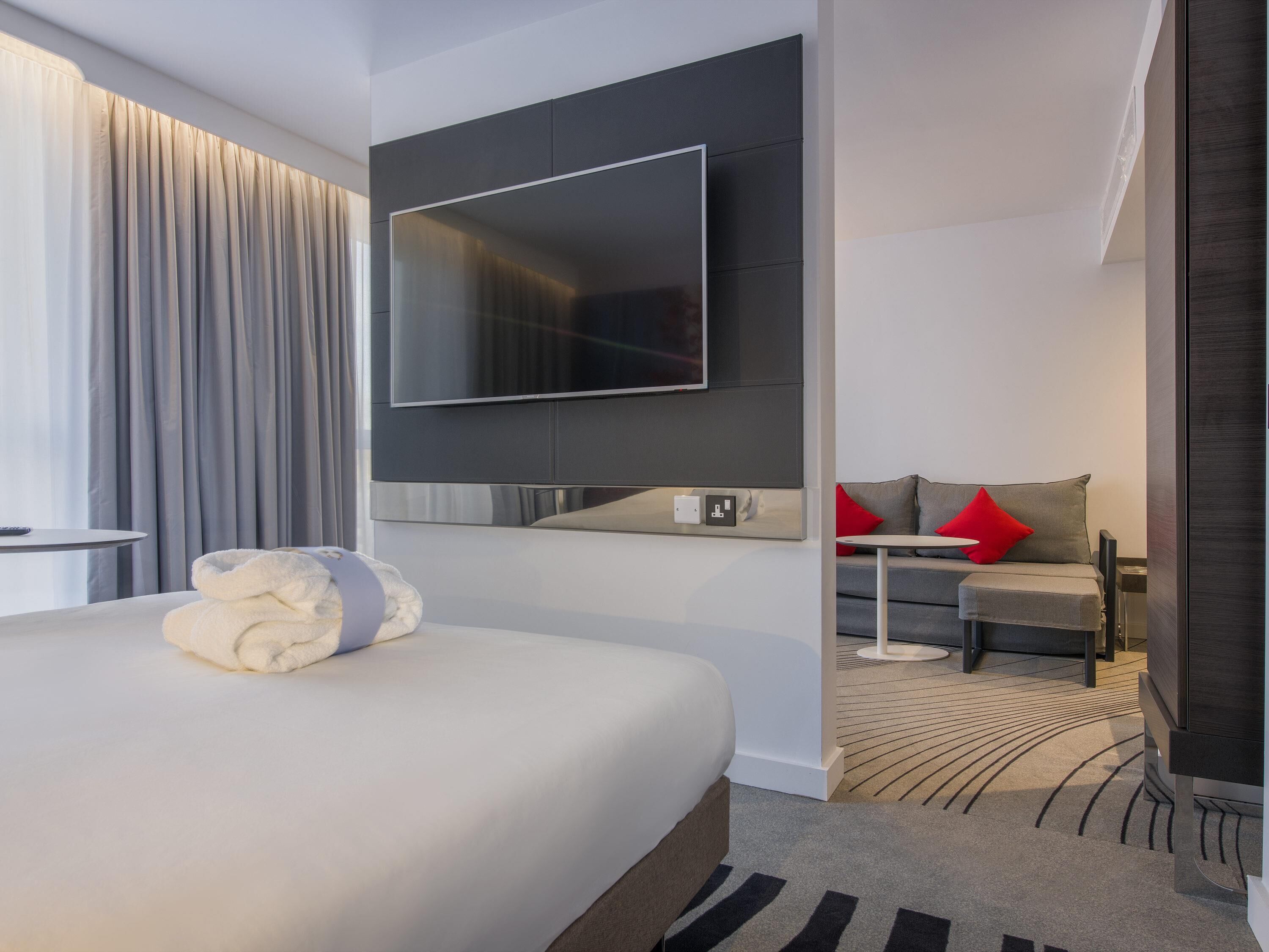 Junior Suite, 1 Queen Bed with Sofa bed | In-room safe, laptop workspace, blackout drapes, iron/ironing board