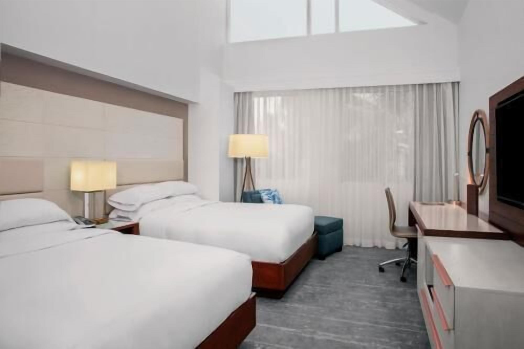 Premium bedding, down comforters, pillowtop beds, in-room safe