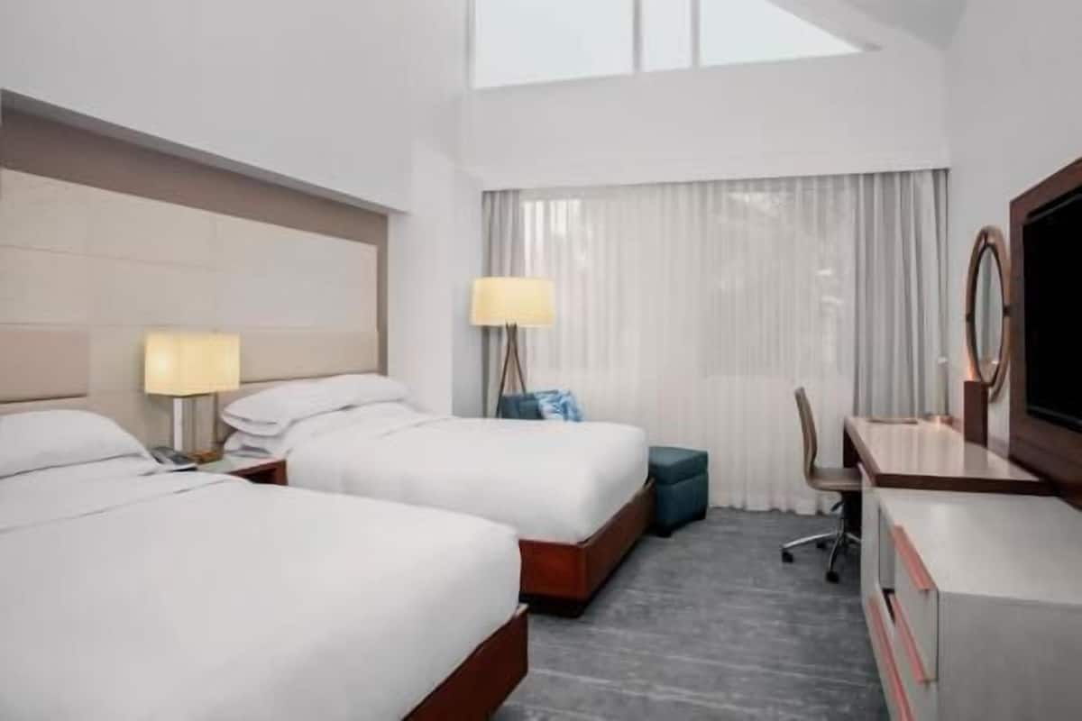 Premium bedding, down comforters, pillowtop beds, in-room safe