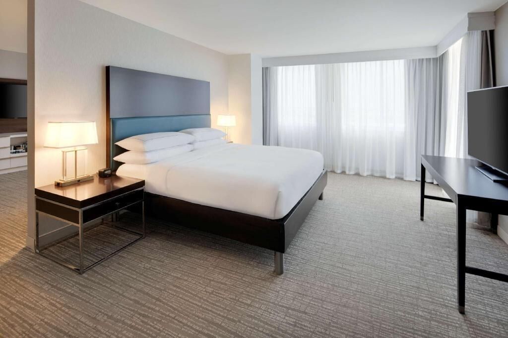 Premium bedding, down comforters, pillowtop beds, in-room safe