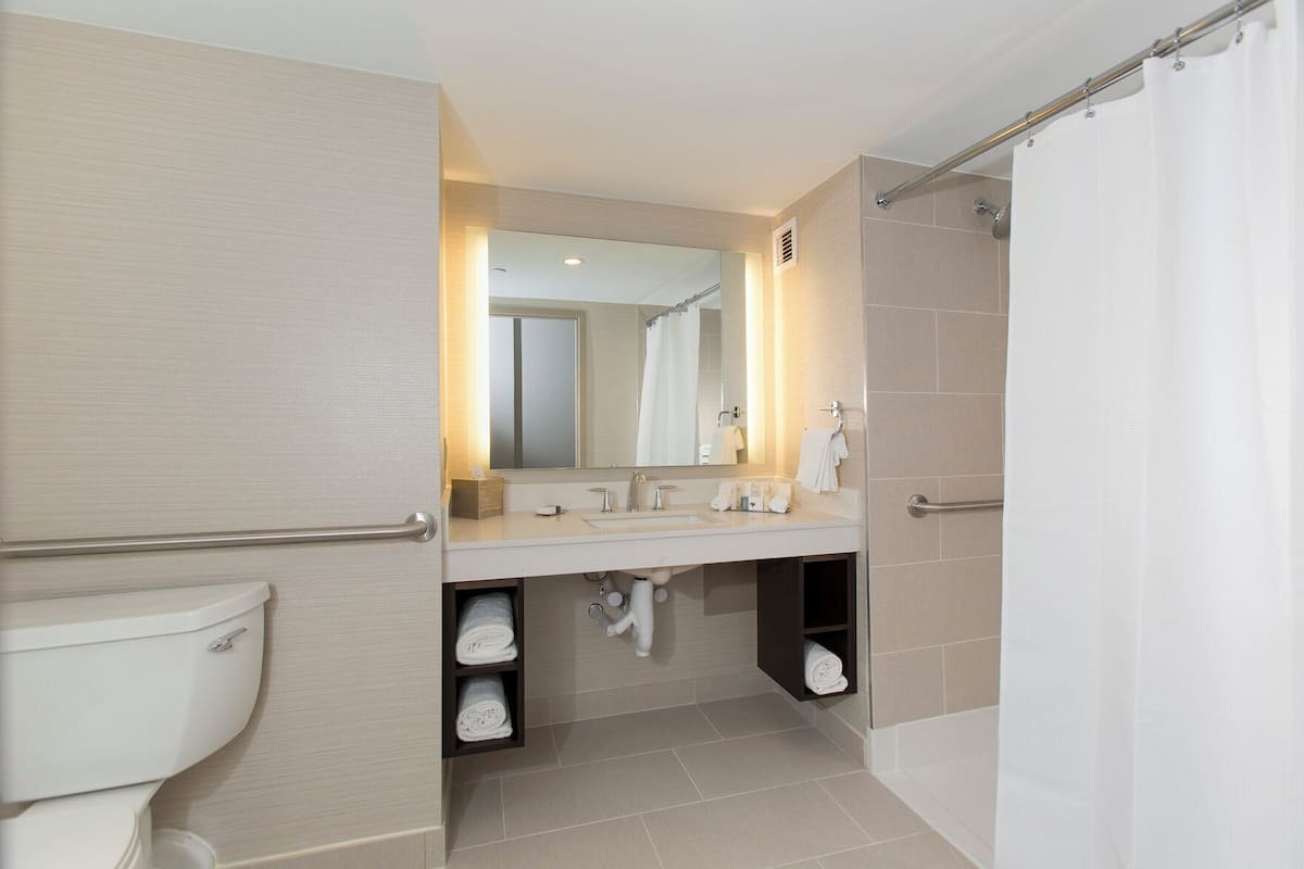 Bathroom | Designer toiletries, hair dryer, towels