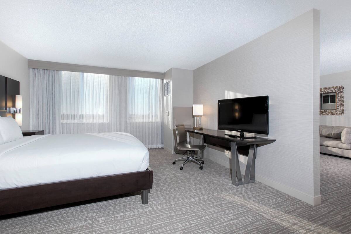 Premium bedding, down comforters, pillowtop beds, in-room safe