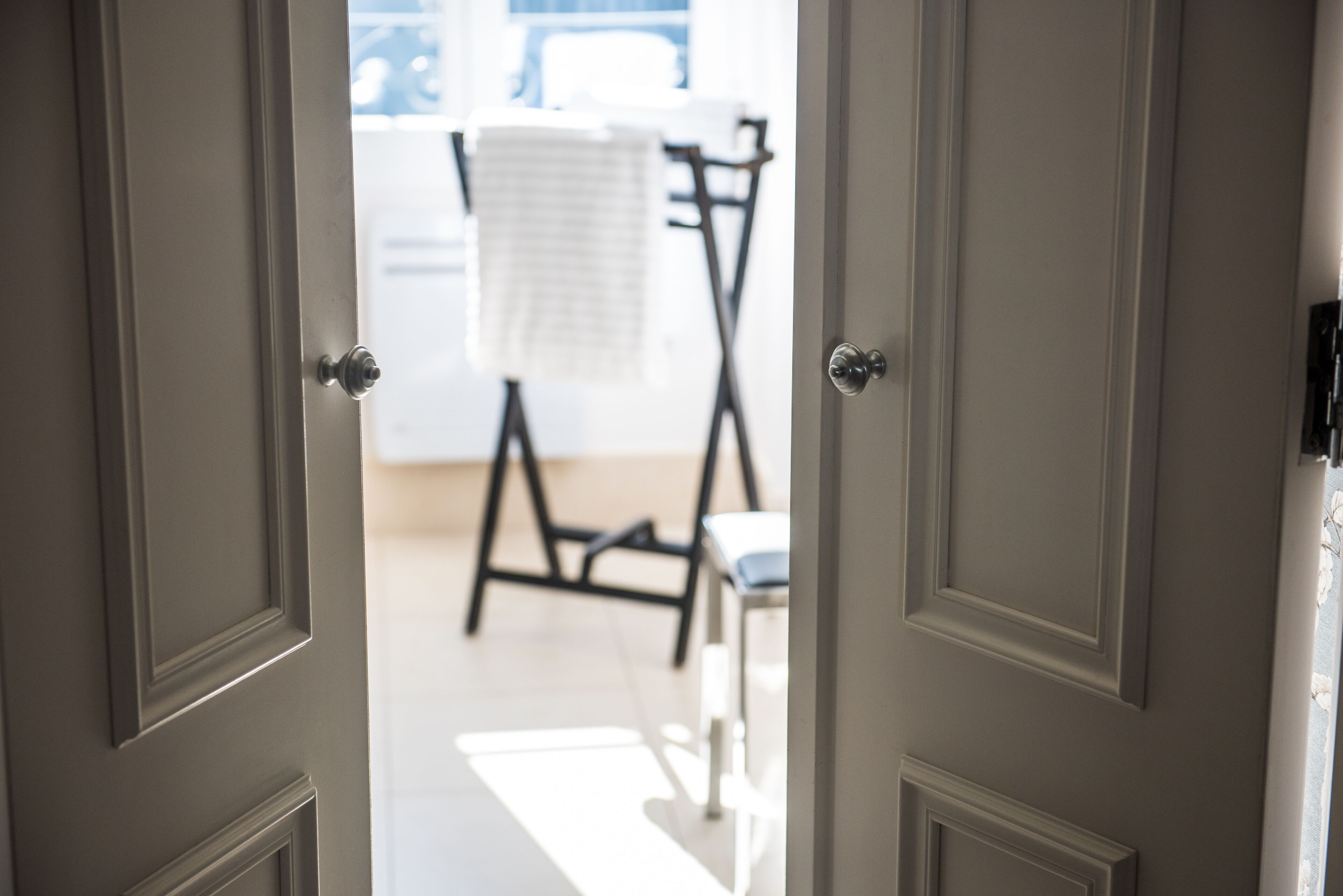 junior suite, city view | bathroom | designer toiletries, hair dryer, bathrobes, slippers