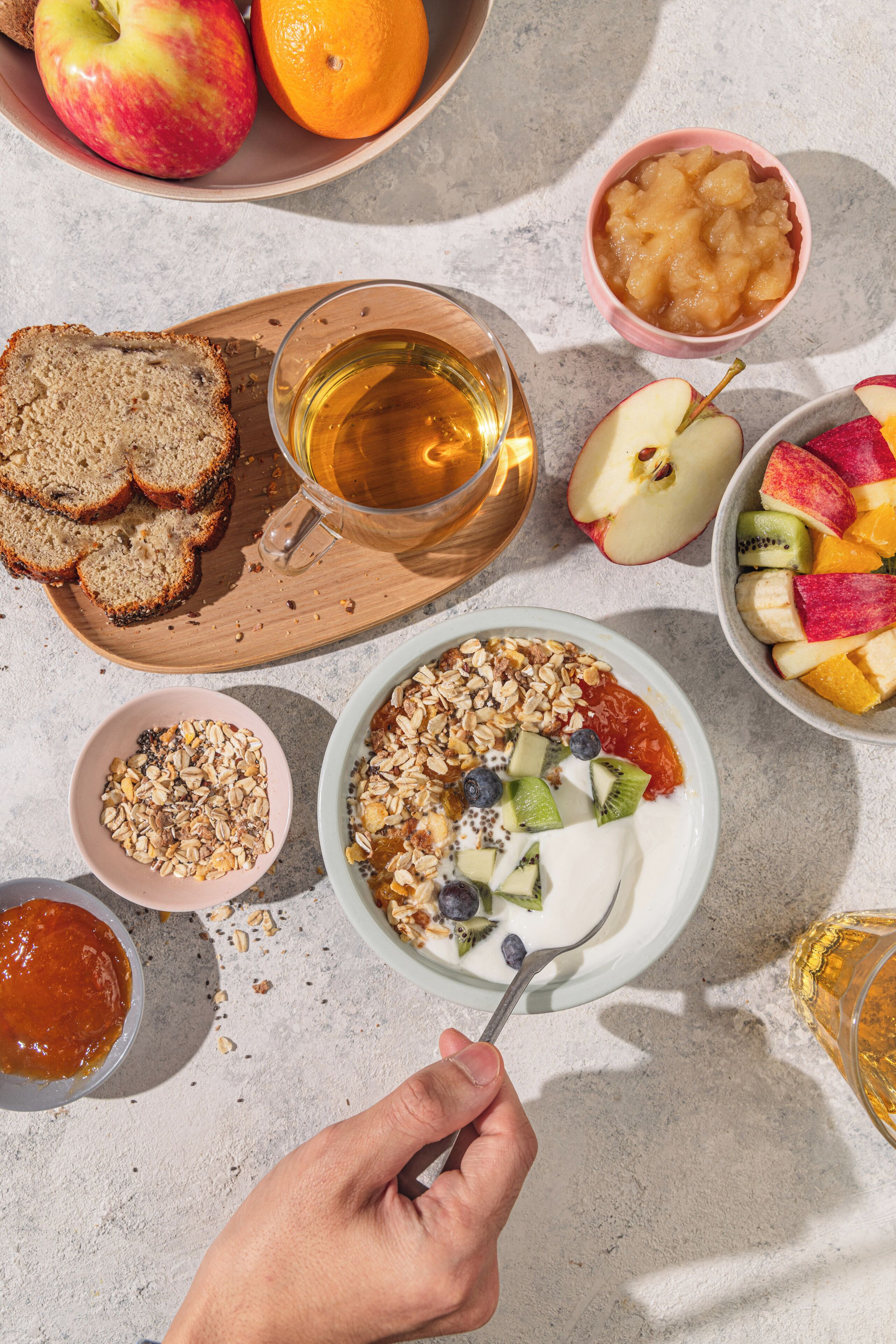 A breakfast setting with various food items and a beverage.