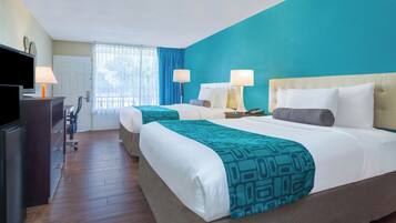 Premium bedding, down duvets, pillow-top beds, in-room safe