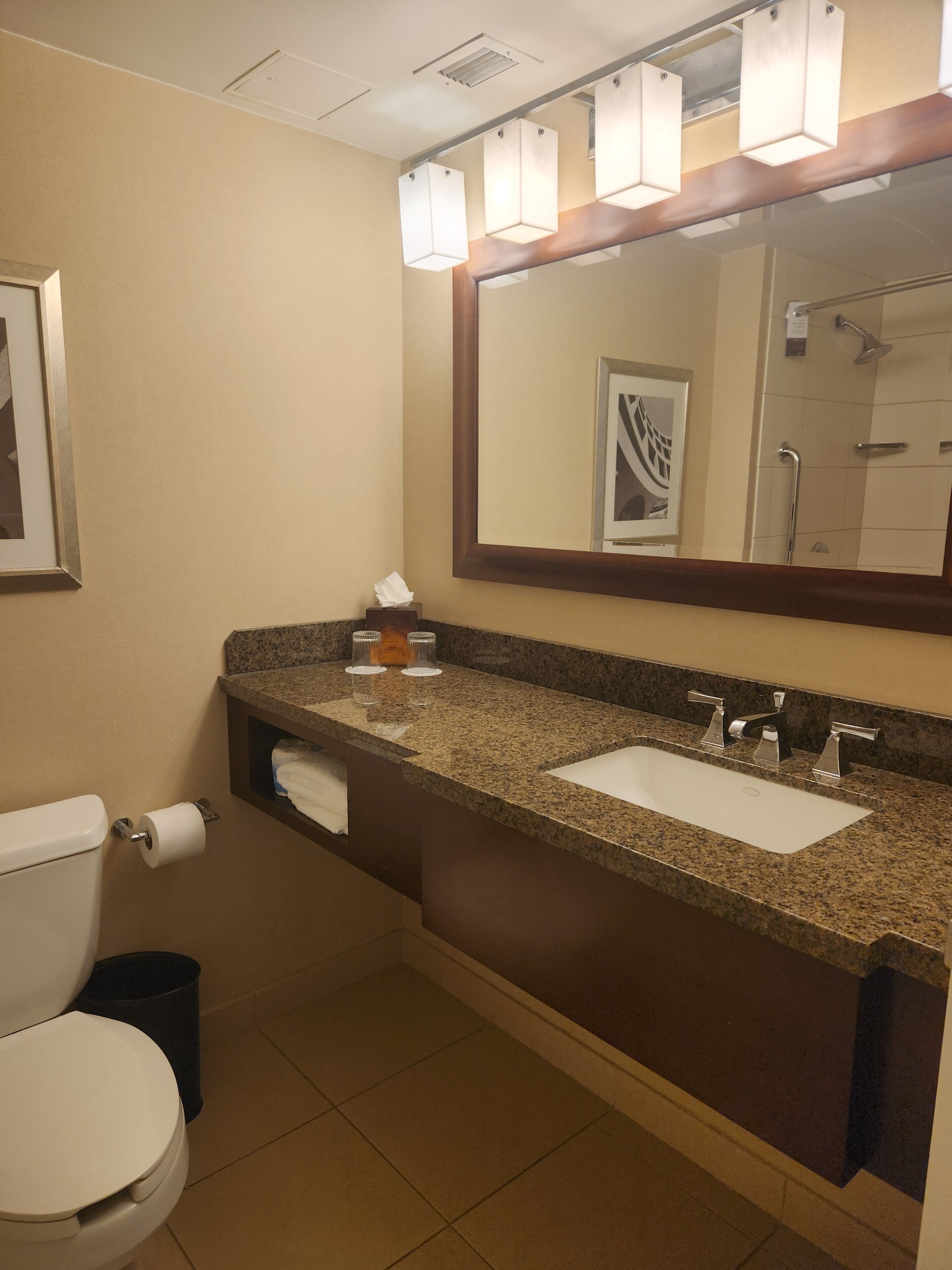 combined shower/bathtub, eco-friendly toiletries, hair dryer, towels