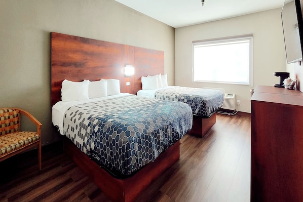 Desk, blackout drapes, iron/ironing board, free cribs/infant beds