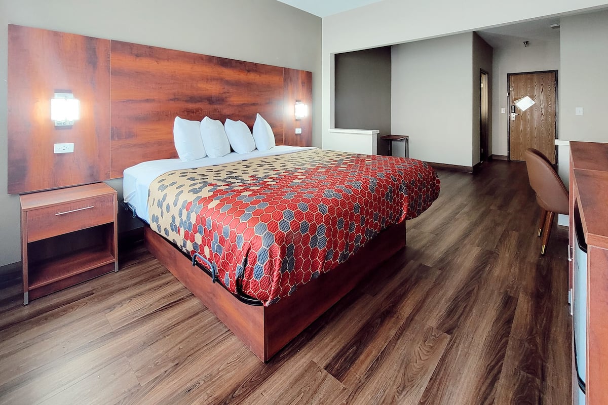 suite, 1 king bed with sofa bed, non smoking | desk, blackout curtains, iron/ironing board, free cots/infant beds