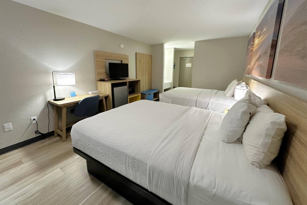 Standard Room, 2 Queen Beds, Non Smoking | Pillowtop beds, in-room safe, desk, laptop workspace