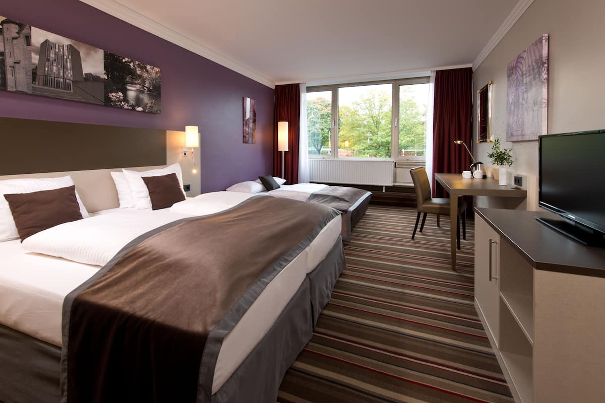 Comfort Room | Desk, soundproofing, iron/ironing board, free cribs/infant beds